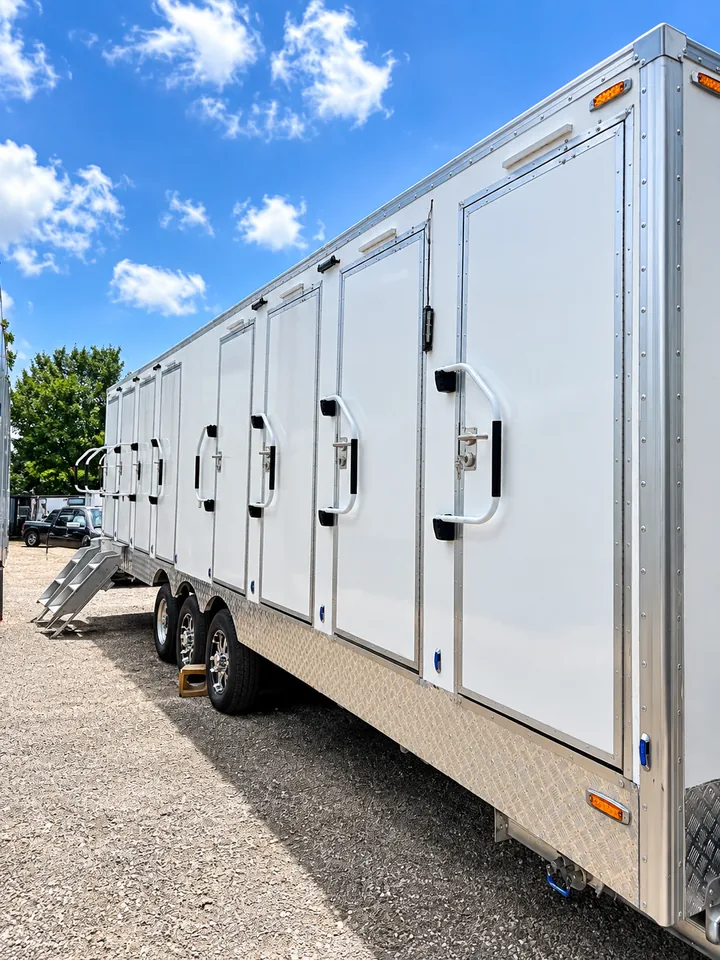 Exterior side view of a 30 ft eight-stall luxury shower-restroom combination trailer