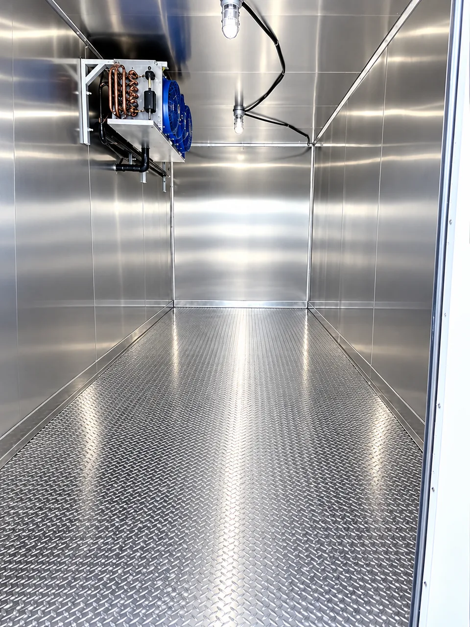 Clean portable refrigerated trailer interior for temporary cold storage
